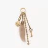Bijou de sac Chloé Symbols en laiton et peau lainée