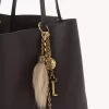 Bijou de sac Chloé Symbols en laiton et peau lainée