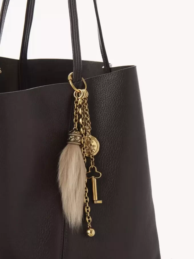 Bijou de sac Chloé Symbols en laiton et peau lainée