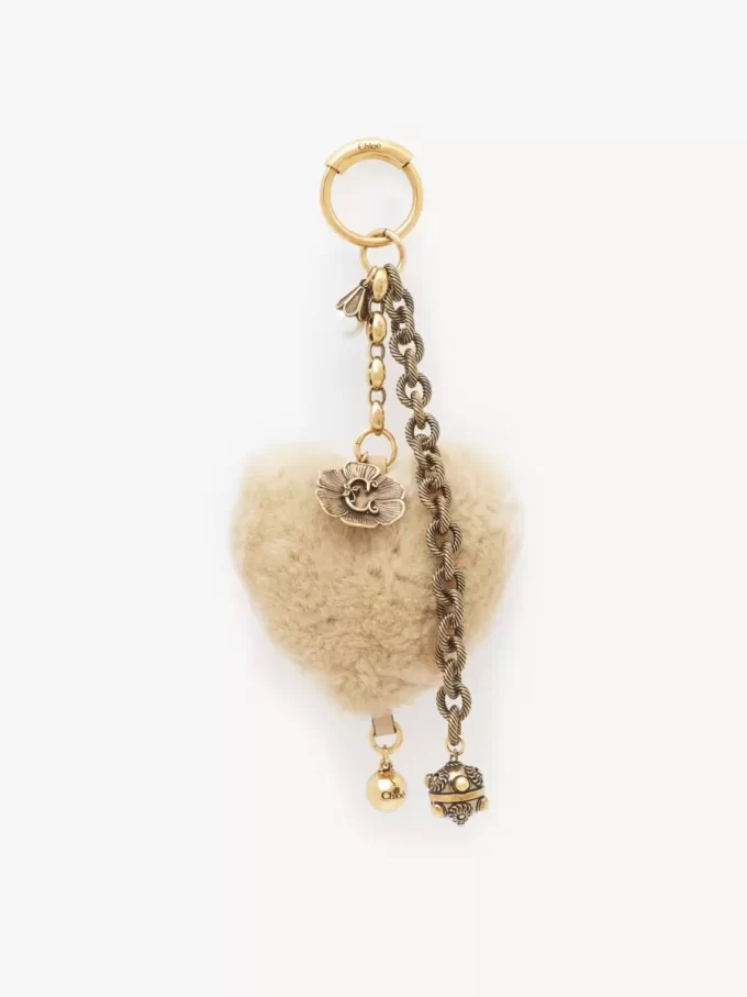 Bijou de sac Chloé Symbols Heart Shearling en laiton