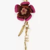 Bijou de sac fleur en raphia et métal Bijou de sac fleur en raphia et métal
