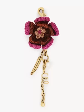 Bijou de sac fleur en raphia et métal