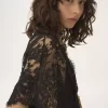 Haut ajusté à volants en dentelle
