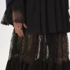 Jupe longue à volants en georgette de soie et dentelle
