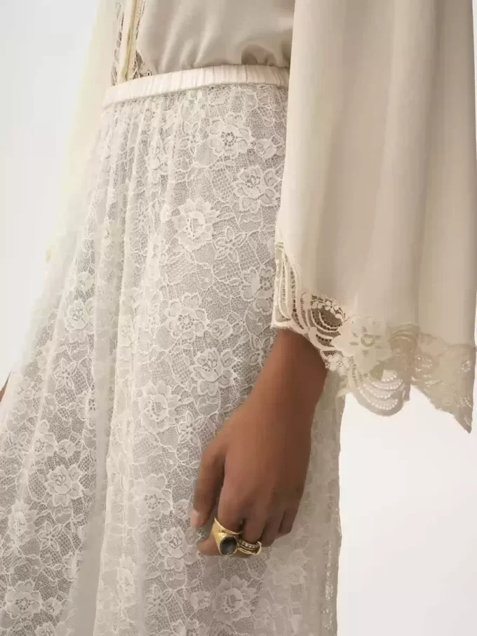 Jupe midi à volants en jacquard de dentelle florale