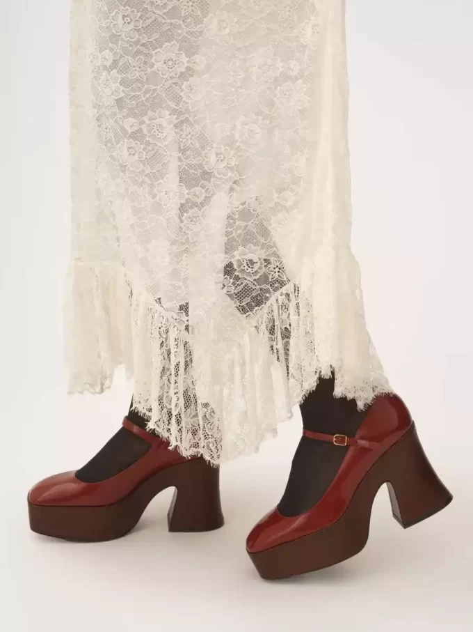 Jupe midi à volants en jacquard de dentelle florale