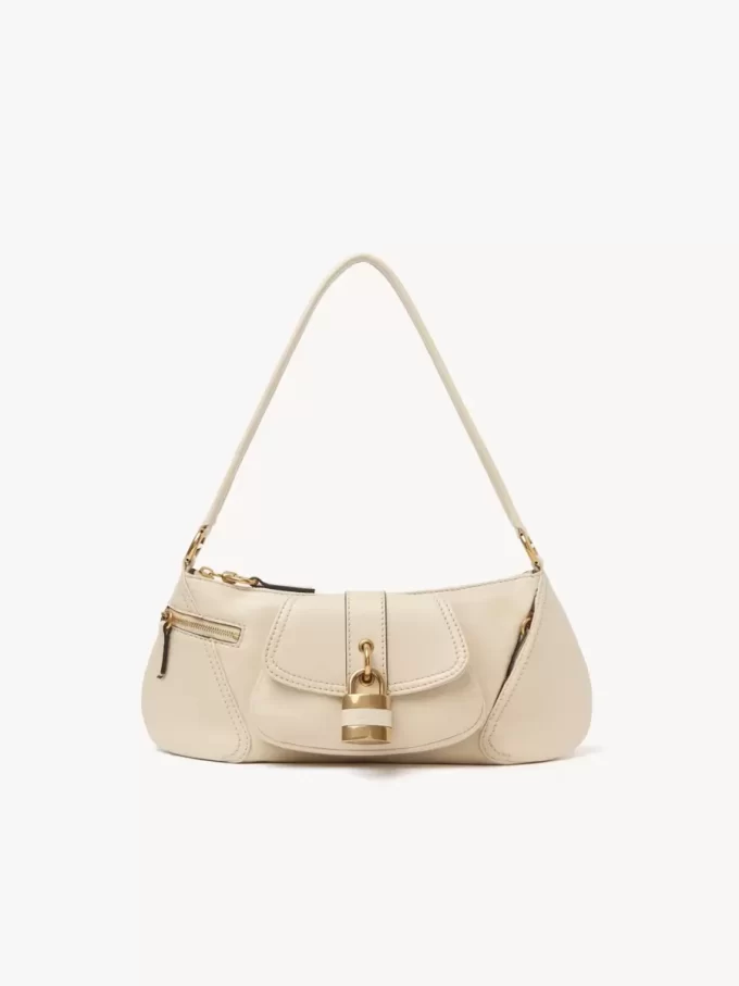 Le sac bandoulière 99 en cuir grainé