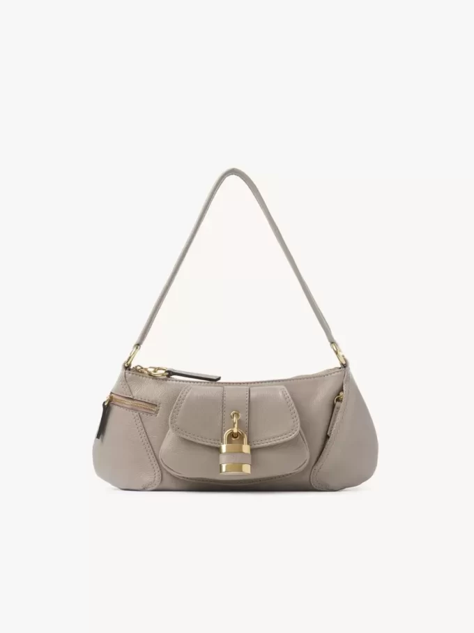Le sac bandoulière 99 en cuir grainé