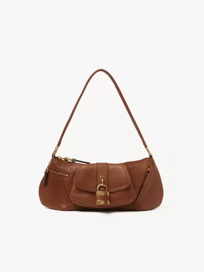 Le sac bandoulière 99 en cuir grainé