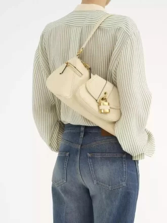 Le sac bandoulière 99 en cuir grainé Le sac bandoulière 99 en cuir grainé