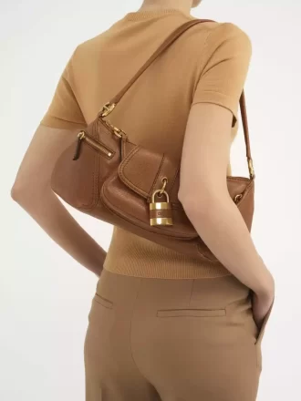 Le sac bandoulière 99 en cuir grainé Le sac bandoulière 99 en cuir grainé