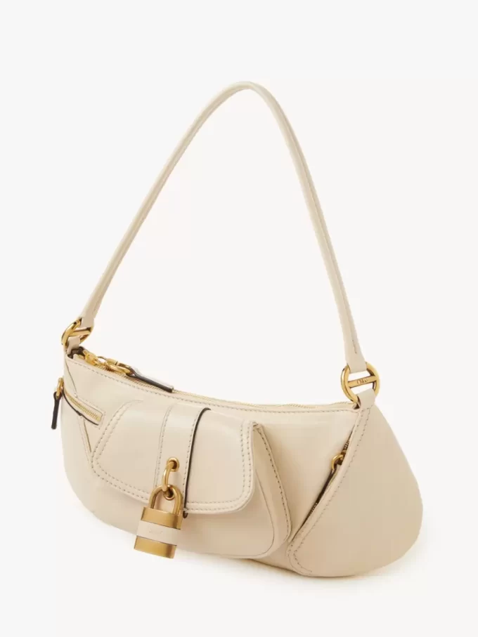 Le sac bandoulière 99 en cuir grainé