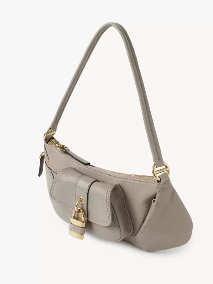 Le sac bandoulière 99 en cuir grainé