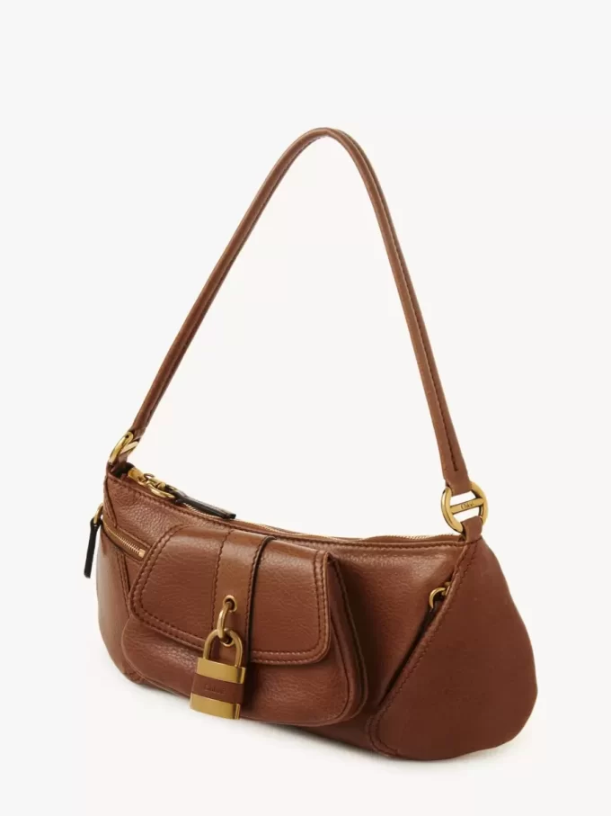 Le sac bandoulière 99 en cuir grainé
