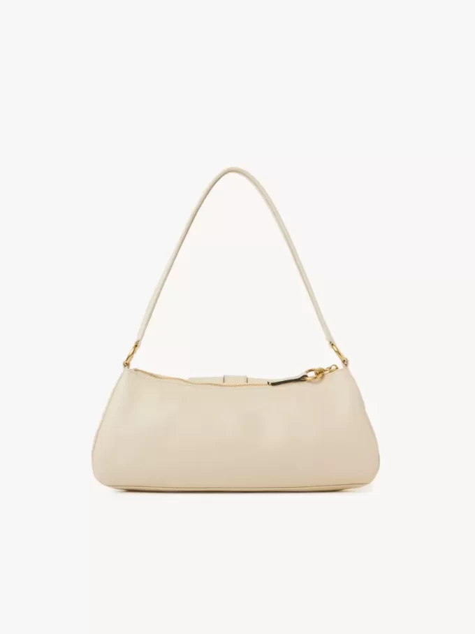 Le sac bandoulière 99 en cuir grainé