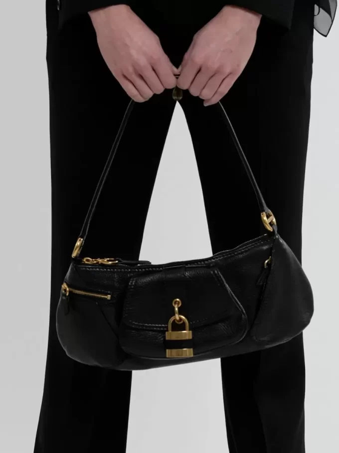 Le sac bandoulière 99 en cuir grainé