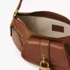 Le sac bandoulière 99 en cuir grainé