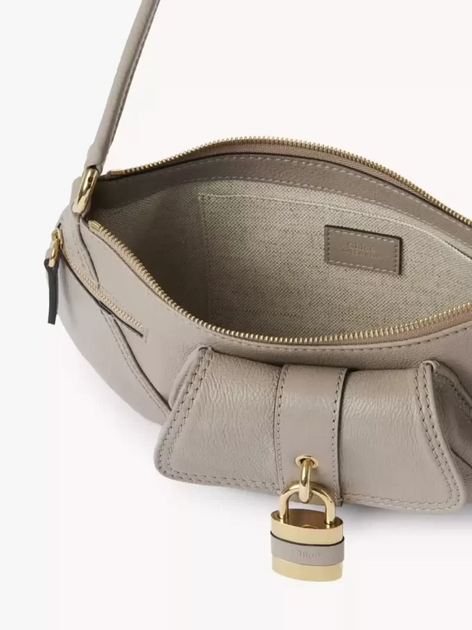 Le sac bandoulière 99 en cuir grainé