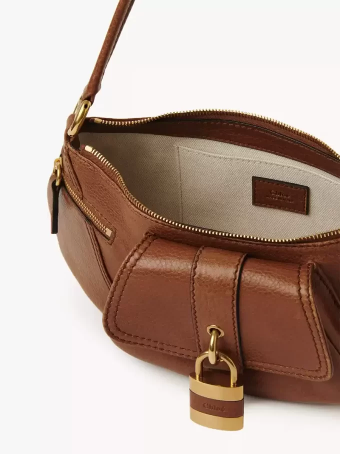 Le sac bandoulière 99 en cuir grainé