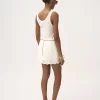 Mini-jupe festonnée en mélange de coton Mini-jupe festonnée en mélange de coton