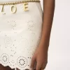 Mini-jupe festonnée en mélange de coton Mini-jupe festonnée en mélange de coton