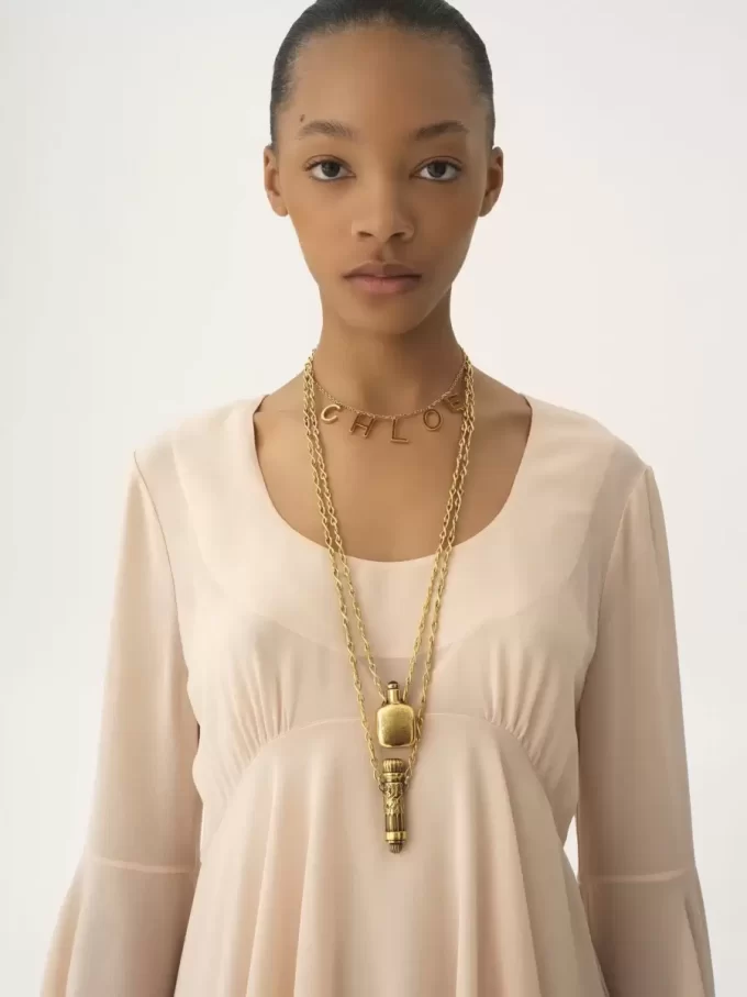 Mini-robe évasée en georgette de soie