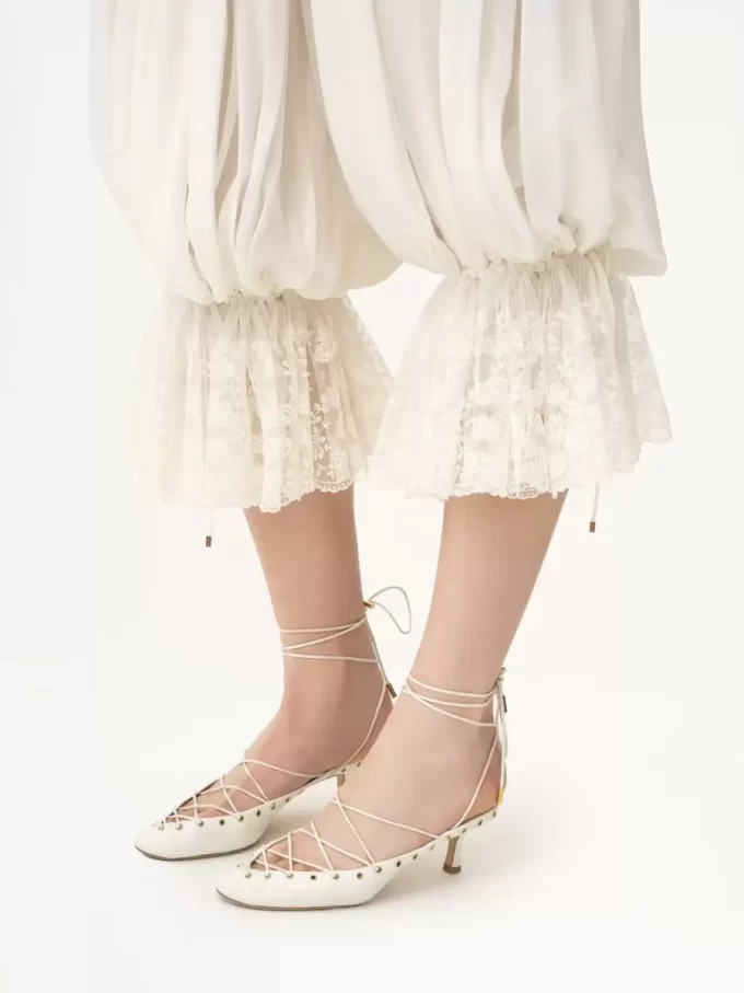 Pantalon court fluide en charmeuse de soie et dentelle Pantalon court fluide en charmeuse de soie et dentelle
