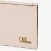 Petit porte-monnaie Chloé Iconic avec fentes pour cartes en cuir brillant
