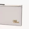 Petit porte-monnaie Chloé Iconic avec fentes pour cartes en cuir grainé