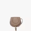 Petit sac de selle Marcie en cuir brillant Petit sac de selle Marcie en cuir brillant