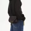 Petit sac de selle Marcie en cuir brillant Petit sac de selle Marcie en cuir brillant
