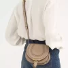 Petit sac de selle Marcie en cuir brillant Petit sac de selle Marcie en cuir brillant