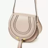 Petit sac de selle Marcie en cuir brillant Petit sac de selle Marcie en cuir brillant