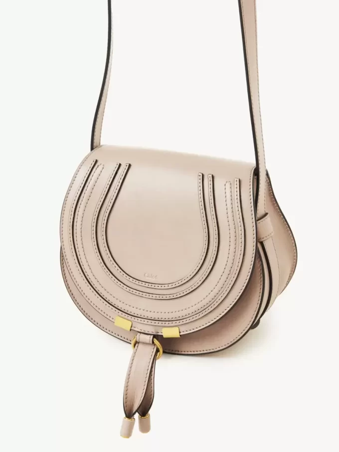 Petit sac de selle Marcie en cuir brillant Petit sac de selle Marcie en cuir brillant