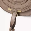 Petit sac de selle Marcie en cuir brillant Petit sac de selle Marcie en cuir brillant