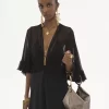 Petit sac à main bracelet en cuir métallisé