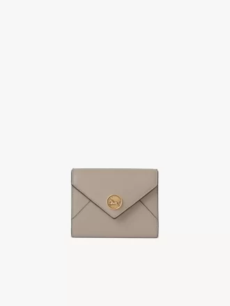 Petite enveloppe à trois volets en cuir grainé Petite enveloppe à trois volets en cuir grainé