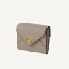 Petite enveloppe à trois volets en cuir grainé Petite enveloppe à trois volets en cuir grainé