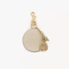 Porte-clés miroir avec coque en cuir brillant Porte-clés miroir avec coque en cuir brillant