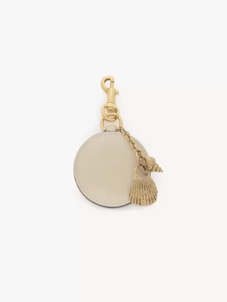 Porte-clés miroir avec coque en cuir brillant