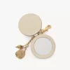 Porte-clés miroir avec coque en cuir brillant Porte-clés miroir avec coque en cuir brillant