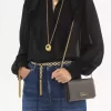 Portefeuille à rabat iconique Chloé sur chaîne en cuir brillant