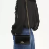 Portefeuille à rabat iconique Chloé sur chaîne en cuir verni