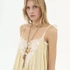 Robe longue à volants en soie habotai et dentelle