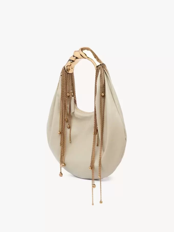 Sac hobo Twisted Shell en cuir brillant Sac hobo Twisted Shell en cuir brillant