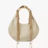 Sac hobo Twisted Shell en cuir brillant Sac hobo Twisted Shell en cuir brillant
