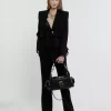 Sac photo en cuir brillant Sac photo en cuir brillant