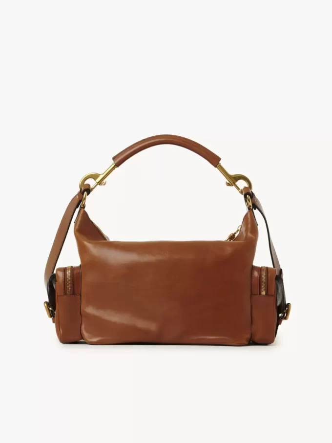 Sac photo en cuir brillant Sac photo en cuir brillant