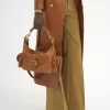 Sac photo en cuir brillant Sac photo en cuir brillant