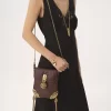 Sac à rabat chaîne Château Treasures en cuir grainé